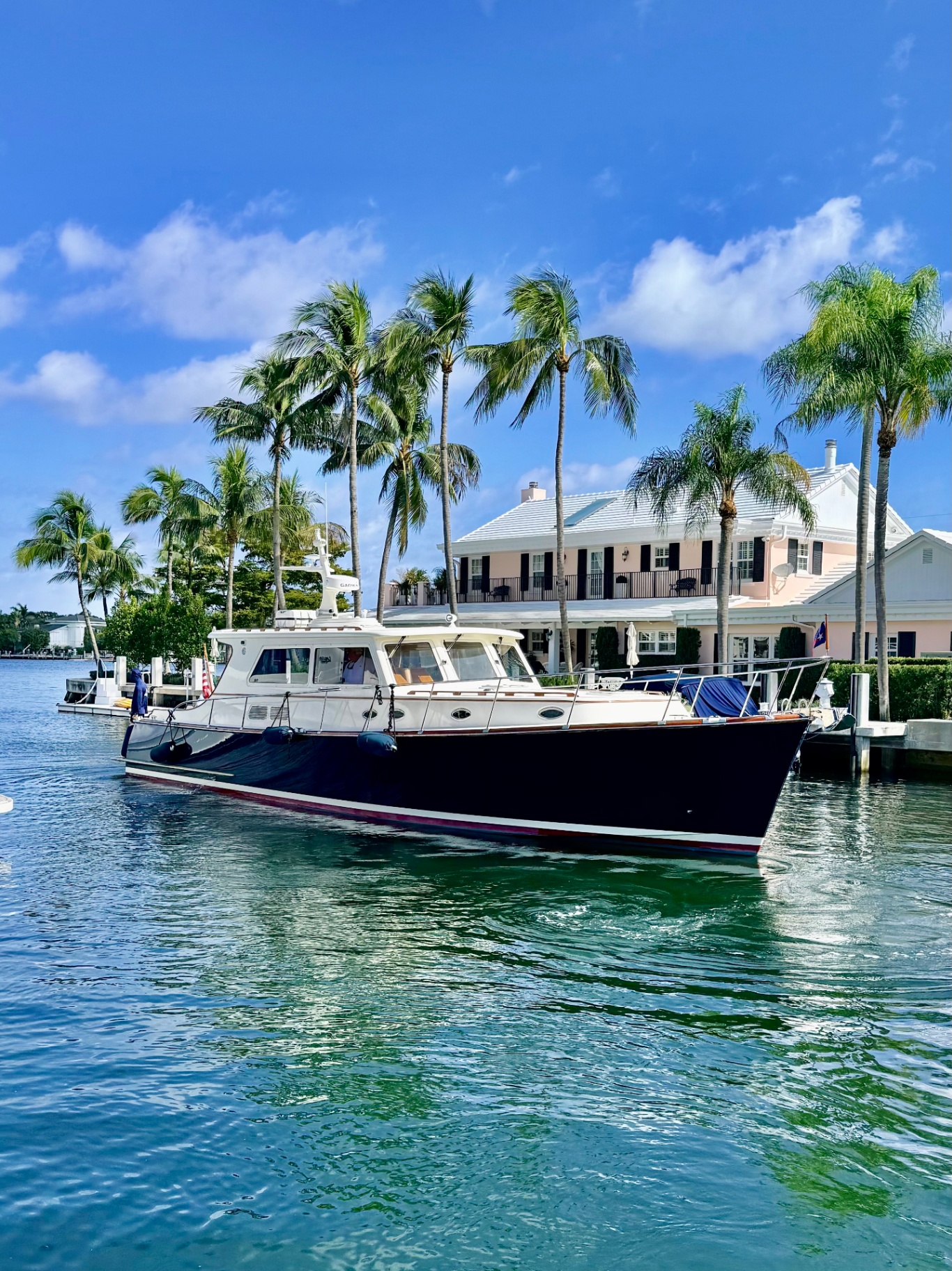 A superyacht at anchor off the South Florida coast at golden hour